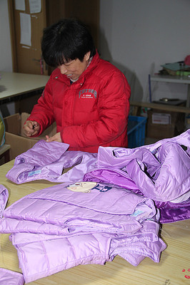 专供淘品牌来图来样，包工包料羽绒服生产线服务